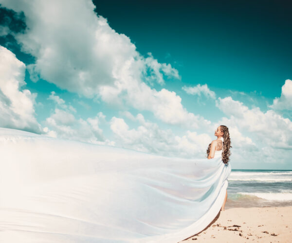 Punta Cana: Flying dresses photoshoot on horses by the beach
